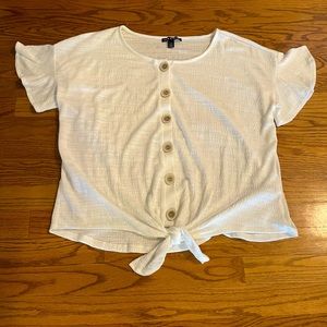 Cute white top with bottoms down the middle. Ties at the bottom. Size medium.